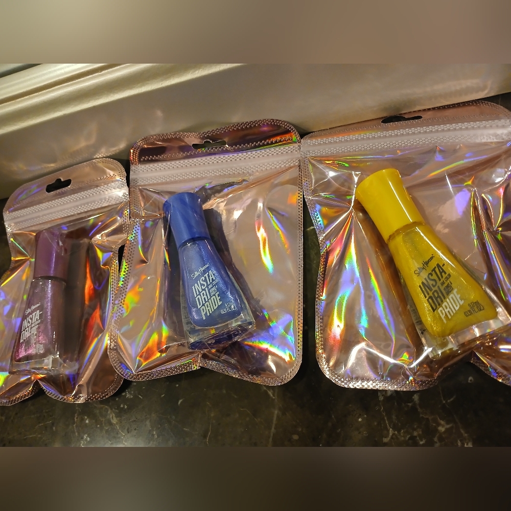 Three bottles of Sally Hansen Insta-Dri Nail Color